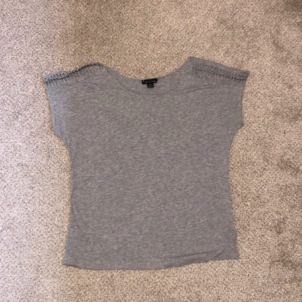 Gray tee with cute stitched design on sleeves!